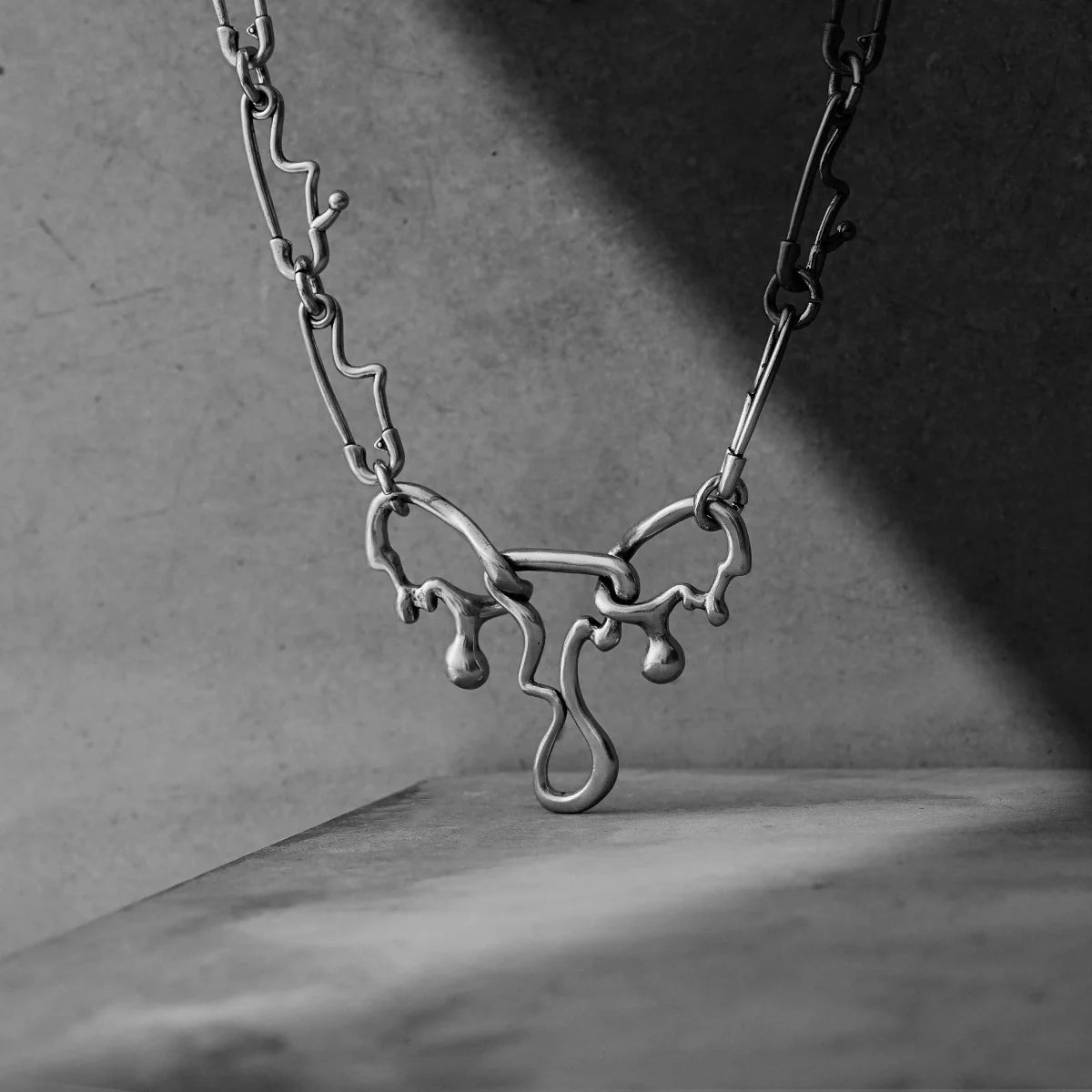 FLUID PIN NECKLACE