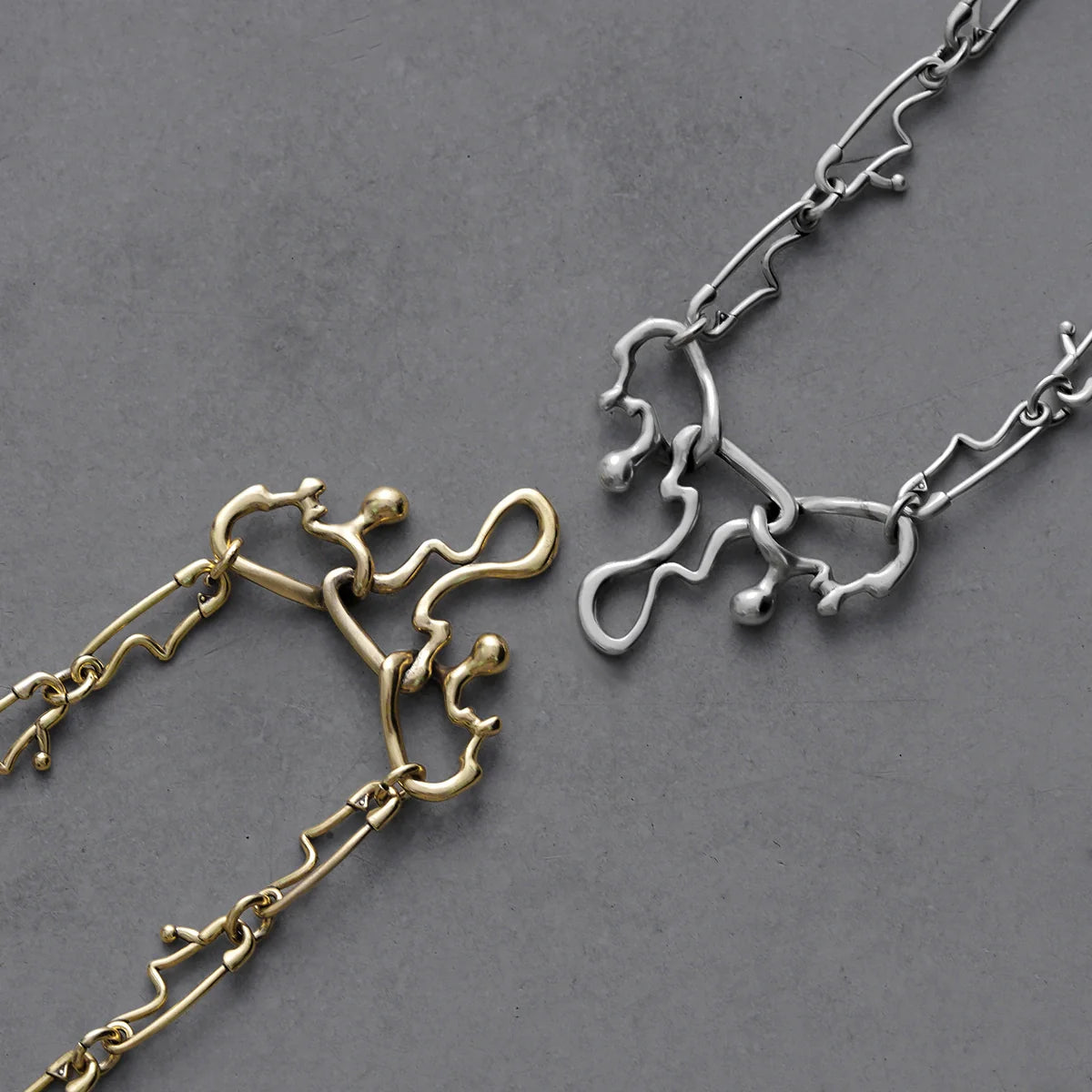 FLUID PIN NECKLACE