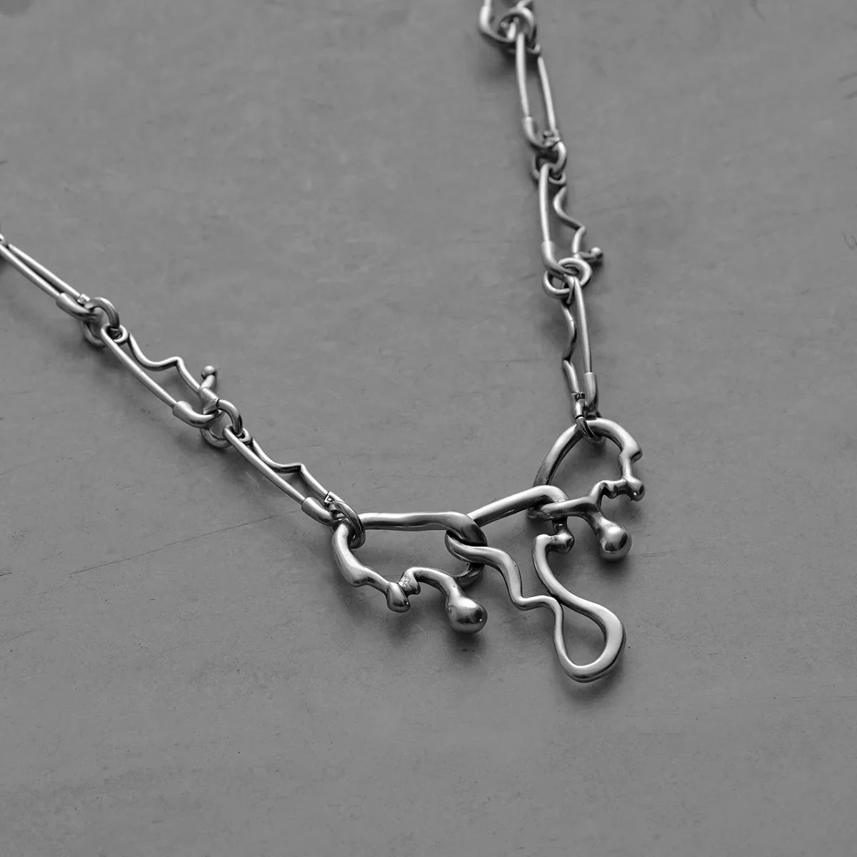 FLUID PIN NECKLACE